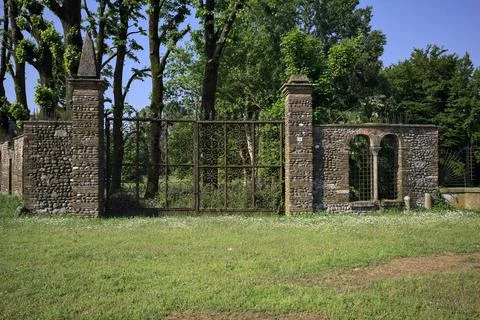 Gate and a garden Stock Photos