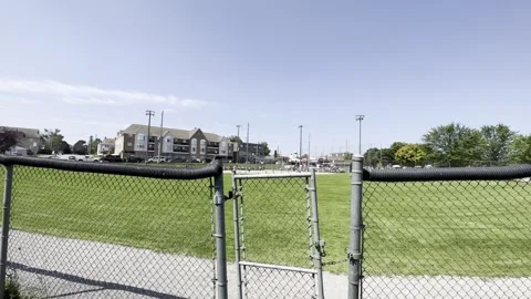 Gate of baseball field open port perry Stock Footage 271409478
