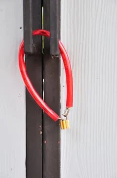 Gate be locked by red wire locking Stock Photos