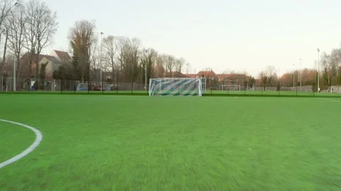 A gate in a football stadium with an empty training football field. Stock Footage 235163768