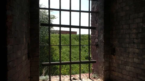 A gate in front of a brick building. Bobruisk Ruins Stock Footage 130139429