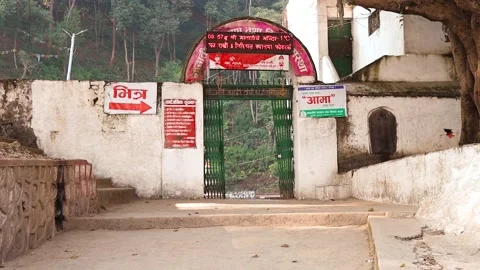 Gate of holy shrine Matatirtha displaying message in LED board Stock Footage 226776117