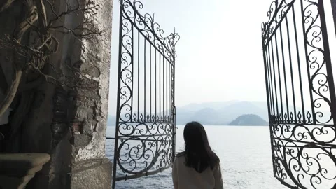 Gate to Lake Como, or Heaven's Gate in the gardens of Villa Cipressi, Varenna Stock Footage 313707163