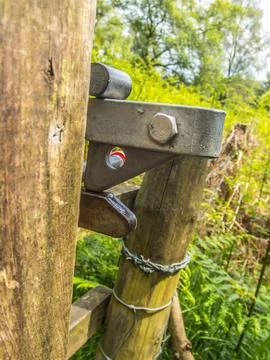Gate latch for field gate closeup from side Stock Photos