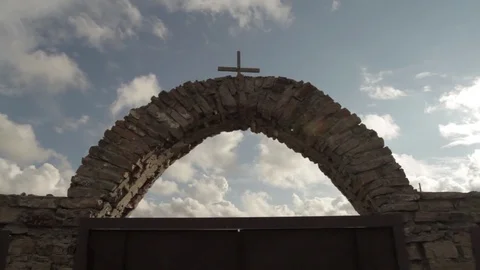 The gate of the monastery with a cross Stock Footage 77807390