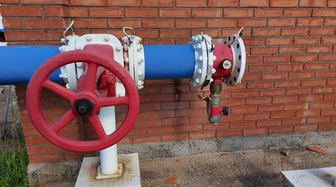 A gate valve with a half-nut and a large valve for connecting fire hoses Stock Photos