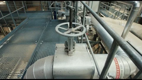 Gate Valve Wheel on Pipework and Grating, Industrial Floor, Overhead Shot Vídeo Stock 341439523