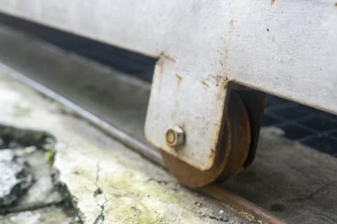 The gate wheel of the house is rusty Stock Photos