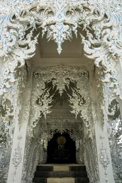 The gate of white temple Stock Photos