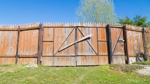 Gate with a wicket Stock Photos
