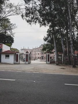 Gated construction site by a quiet road Stock Photos
