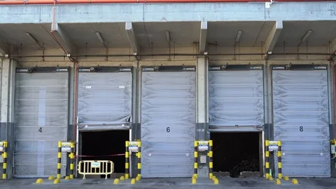 Gates for unloading garbage in a waste recycling plant. Stock Footage 118932804