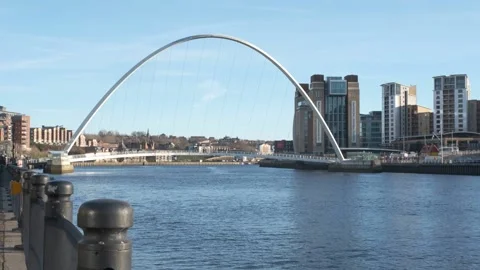 Gateshead Millennium Bridge spans the River Tyne Stock Footage 326055706