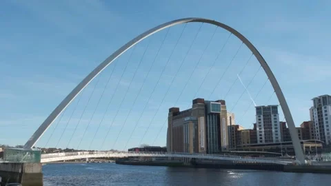Gateshead Millennium Bridge spans the River Tyne Stock Footage 326057246