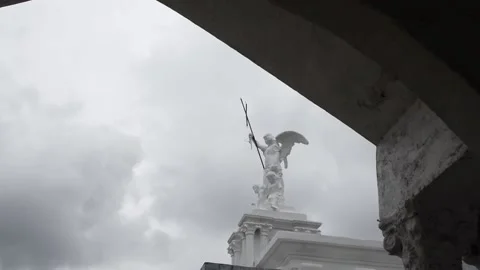 Gateway entry angel statue landmark inside the municipal public cemetery Stock-Footage 220345386