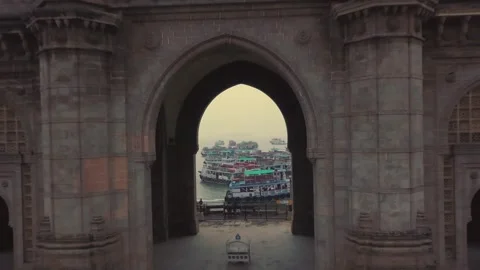 Gateway of India at Sunrise, Drone Pullback Revealing Monument and Boats Video stock 333161284