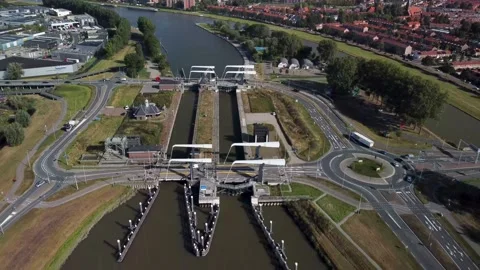 Gateway lock sluice drawbridge construction on a river or canal Stock Footage 163100821