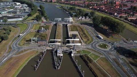 Gateway lock sluice drawbridge construction on river, canal for passing vessels Stock Footage 218578552