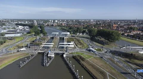 Gateway lock sluice drawbridge construction on river or canal Stock Photos