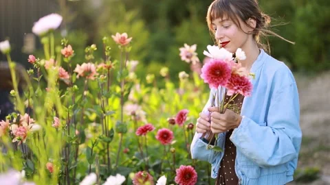Gathering Flowers in a Mountain Garden Stock Footage 282997239