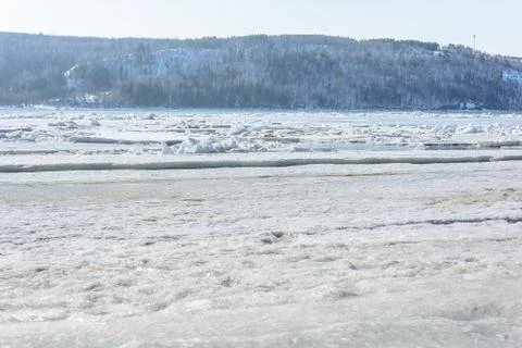 The gathering of ice from the river in early spring Stock Photos
