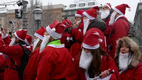 Gathering Santa Clauses taking selfie photo with mobile Asian ethnicity Stock Footage 70642020