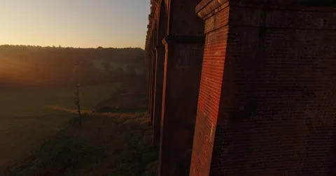 Gatwick Express at Sunrise, Moving Train Shot Drone Stock Footage