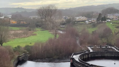 Gauging basin on River Etherow below Bottoms reservoir closer view, panning Stock-Footage 331950498