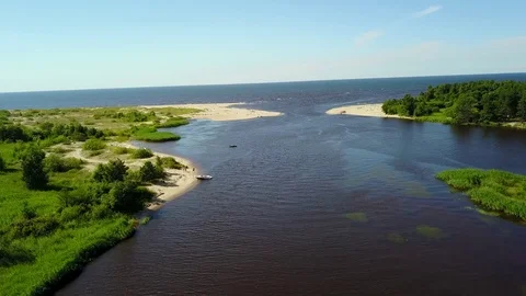 Gauja river Latvia drain into Baltic Sea aerial drone top view 4K UHD video Stock Footage 83965597
