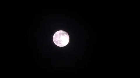Gauzy clouds passing over a full moon Video stock 206296627