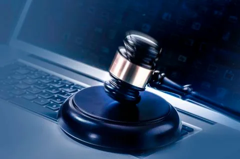 Gavel on laptop computer. Stock Photos