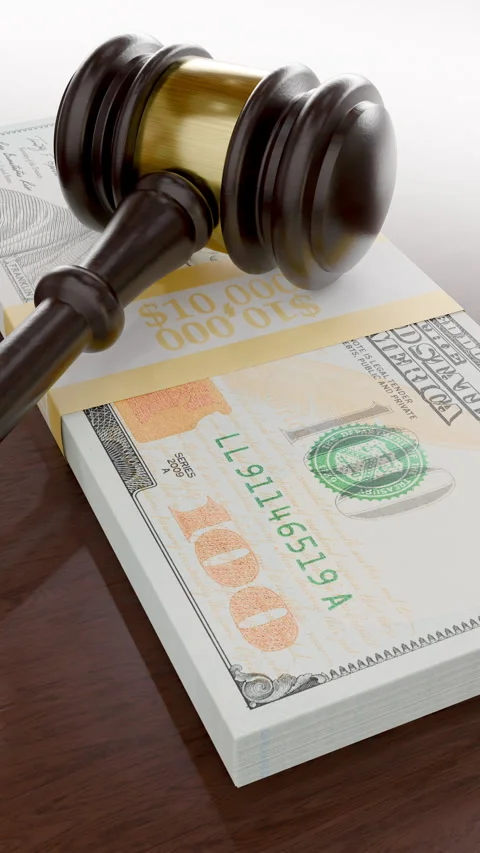 Gavel Resting on Stack of One Hundred Dollar Bills. Stock Footage 310861552