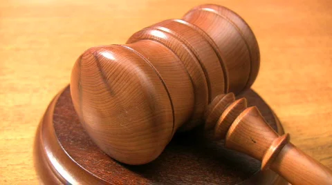 Gavel striking a sounding block. Stock Footage