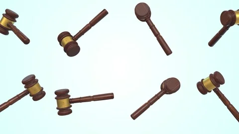 Gavels Falling on a Light Blue Background. Mallet of the Judge Wooden Hammer 4K Stock Footage 296269855