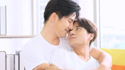 gay men kissing tenderly