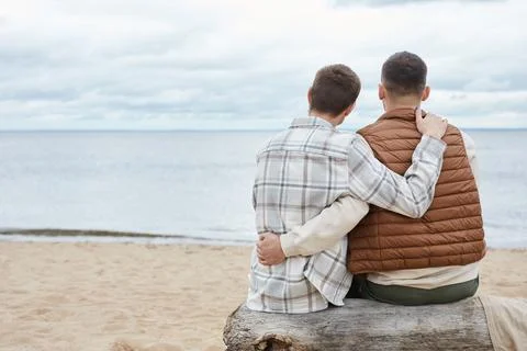Gay Couple on Beach Minimal Stock Photos