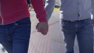 Gay Couple Hold Hands And Walk On Rainbow Crosswalk In San Francisco Stock Footage