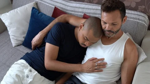 Gay Couple Using Laptop at Sofa Stock Footage 98626536