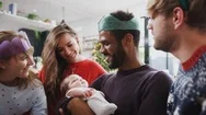 Gay Male Couple With Adopted Baby Daughter Celebrating First Christmas With Stock Footage