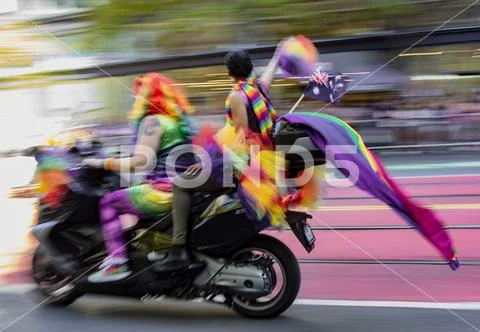 Gay Pride Parade in San Francisco - Dykes On Bikes lead the parade past blurr Stock Photos