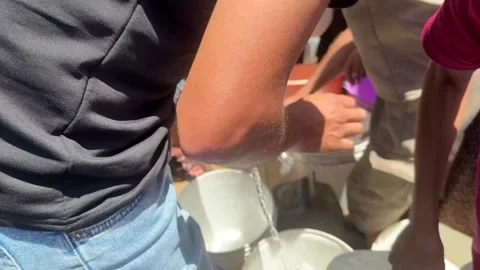 Gaza Residents Queue For Water 3 Stock Footage 336315820
