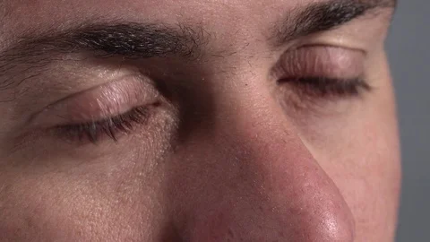 Gaze of the young man while laughing Stock Footage 72827012