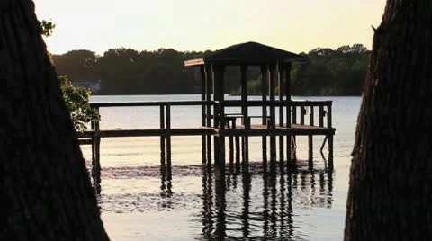Gazebo Dock on the Lake at Dusk (loop) Stock Footage 8986374