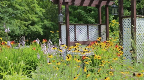 Gazebo in flower garden Stock Footage 28894604