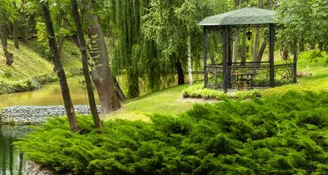 Gazebo in a park in spring. Stock Photos