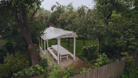 Gazebo on the plot, white gazebo, beautiful territory of a private house Vídeos de archivo 315002351