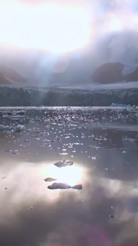 Gazing Over Floating Ice in Svalbard's Arctic Waters at Daytime Stock Footage 327015796
