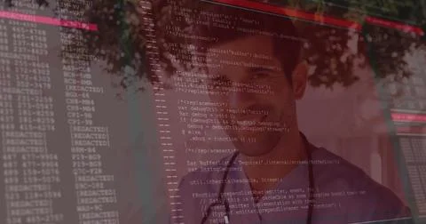 Gazing software developer viewing code through glass panel at office, with Stock Photos