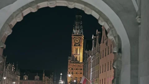 Gdansk Main Town Hall Clock Tower at Night Framed by Arch Stock Footage 337183847