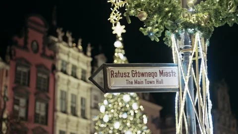 Gdansk Main Town Hall Direction Sign Amidst Festive Christmas Lights Video stock 337183892